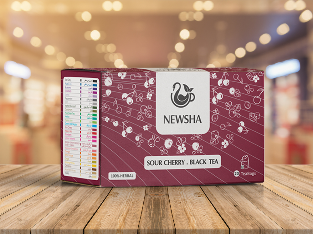 Maroon tea box labeled "Newsha Sour Cherry Black Tea" with floral designs, a cup logo, and "100% Herbal." Contains 20 tea bags.