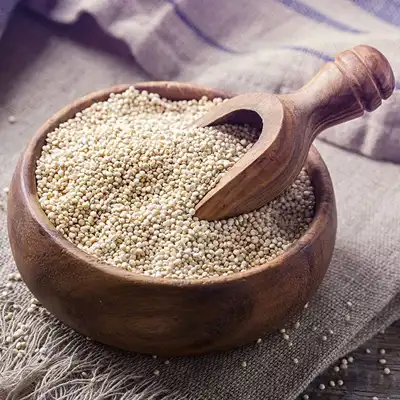 A bowl of quinoa, a nutritious superfood known for its health benefits and versatility in meals.
